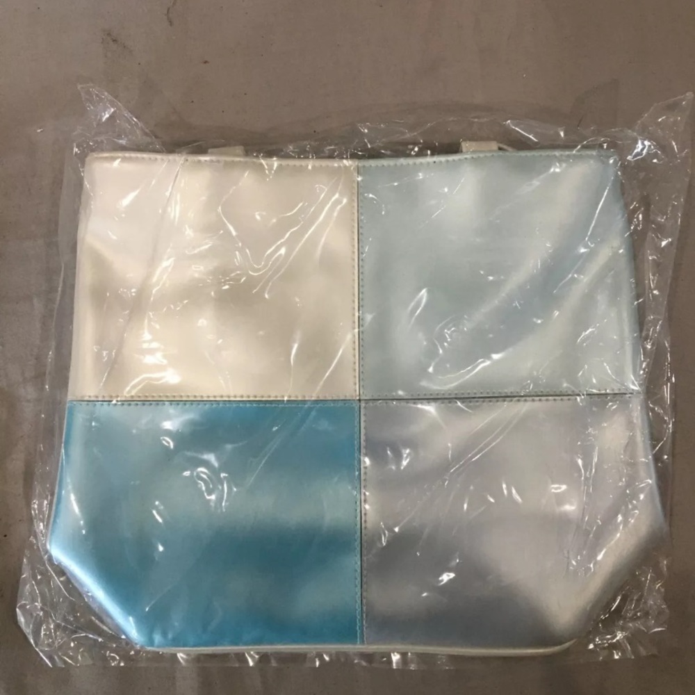 Avon vintage tote kept sealed